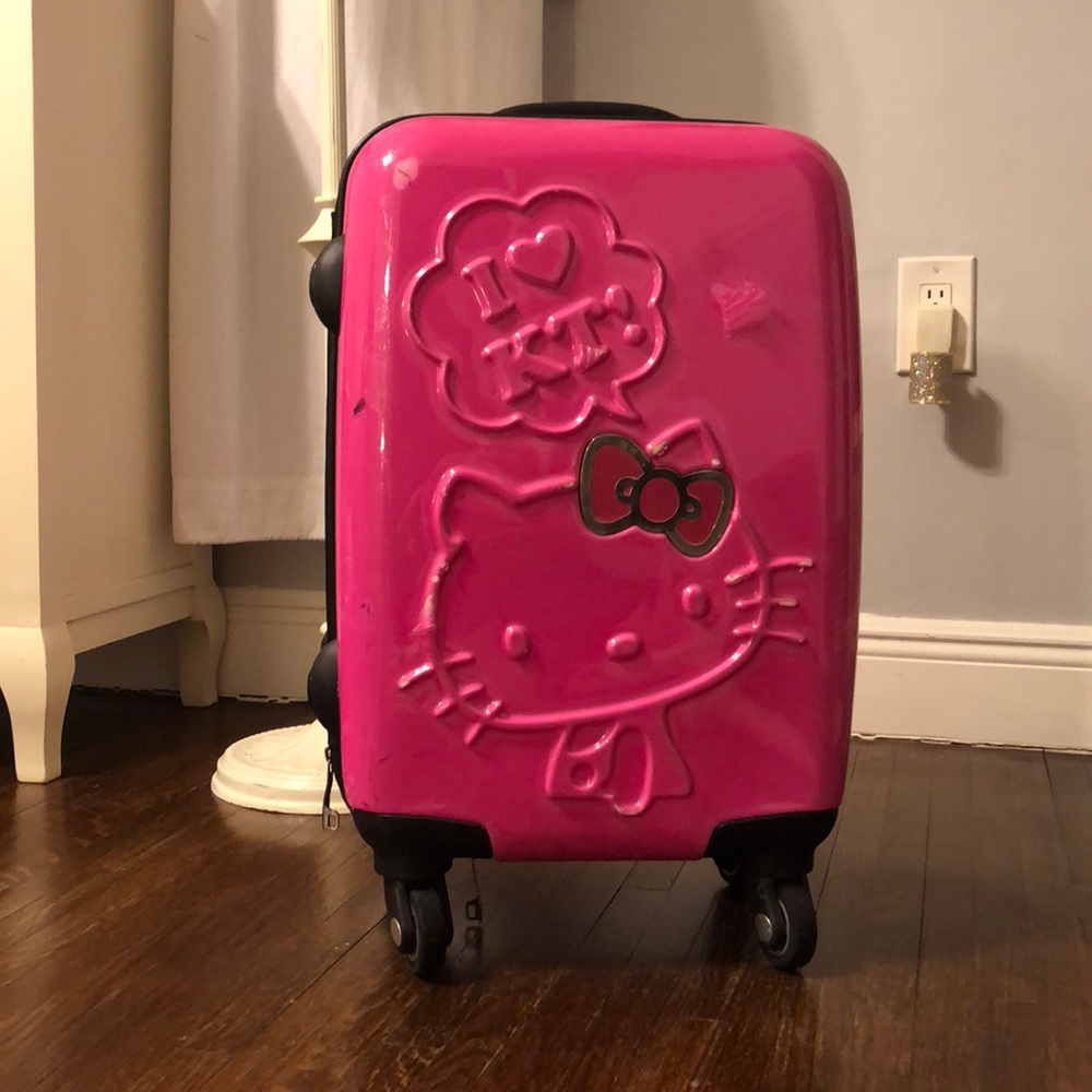 Hello kitty hot pink carry on luggage!!